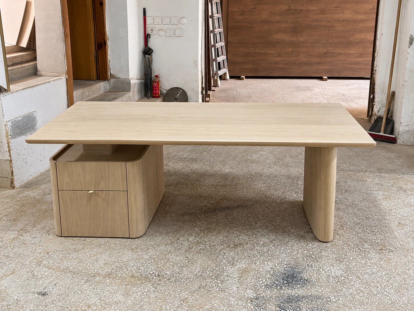 Desk assembled in the workshop · Retouched project image