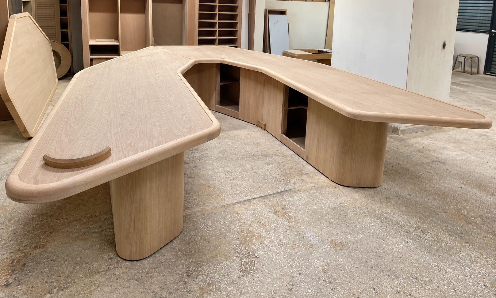 Conference table in production · Retouched project image